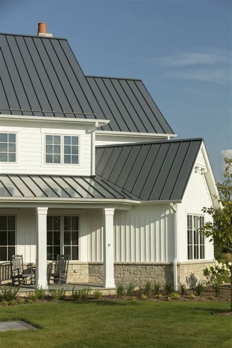 grey farm house with a blue metal roof|farmhouse metal roofing colors.